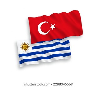 Banderas de olas de tela vectorial nacional de Turquía y la República Oriental del Uruguay aisladas en fondo blanco. de 1 a 2.
