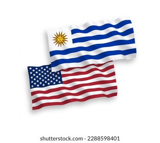 National vector fabric wave flags of Oriental Republic of Uruguay and USA isolated on white background. 1 to 2 proportion.