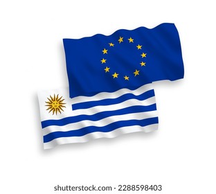 Banderas de olas de tela vectorial nacionales de la Unión Europea y la República Oriental del Uruguay aisladas en fondo blanco. de 1 a 2.
