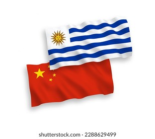 National vector fabric wave flags of Oriental Republic of Uruguay and China isolated on white background 1 to 2 proportion.