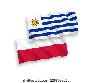 Banderas de olas de tela vectorial nacional de la República Oriental del Uruguay y Polonia aisladas en fondo blanco. de 1 a 2.