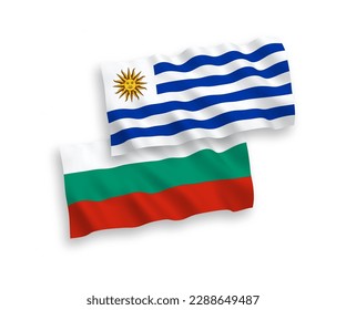 National vector fabric wave flags of Bulgaria and Oriental Republic of Uruguay isolated on white background. 1 to 2 proportion.