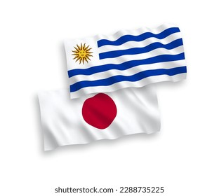 National vector fabric wave flags of Japan and Oriental Republic of Uruguay isolated on white background. 1 to 2 proportion.