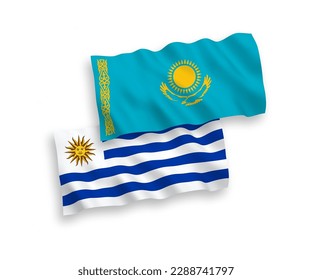 Banderas de olas de tela vectorial nacional de Kazajistán y la República Oriental del Uruguay aisladas en fondo blanco. de 1 a 2.