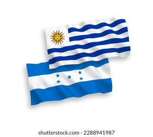 National vector fabric wave flags of Oriental Republic of Uruguay and Honduras isolated on white background. 1 to 2 proportion.