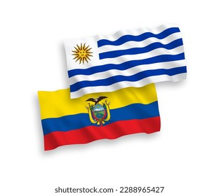 National vector fabric wave flags of Oriental Republic of Uruguay and Ecuador isolated on white background. 1 to 2 proportion.