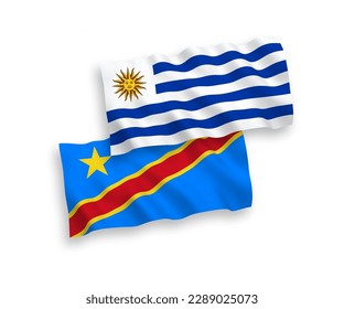 National vector fabric wave flags of Oriental Republic of Uruguay and Democratic Republic of the Congo isolated on white background. 1 to 2 proportion.