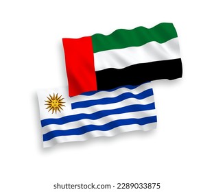 National vector fabric wave flags of Oriental Republic of Uruguay and United Arab Emirates isolated on white background. 1 to 2 proportion.