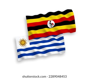 National vector fabric wave flags of Oriental Republic of Uruguay and Uganda isolated on white background. 1 to 2 proportion.
