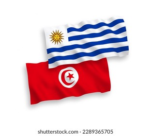 Banderas de olas de tela vectorial nacional de la República Oriental del Uruguay y la República de Túnez aisladas en fondo blanco. de 1 a 2.