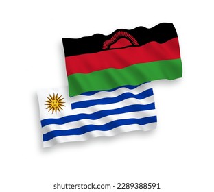 National vector fabric wave flags of Oriental Republic of Uruguay and Malawi isolated on white background. 1 to 2 proportion.