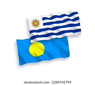 Banderas de olas de tela vectorial nacional de la República Oriental del Uruguay y Palau aisladas en fondo blanco. de 1 a 2.