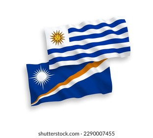National vector fabric wave flags of Oriental Republic of Uruguay and Republic of the Marshall Islands isolated on white background. 1 to 2 proportion.