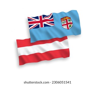 National vector fabric wave flags of Austria and Republic of Fiji isolated on white background. 1 to 2 proportion.