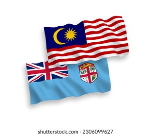 Nationale Vektor-Wellen-Flaggen der Republik Fidschi und Malaysias einzeln auf weißem Hintergrund. 1 bis 2 %.