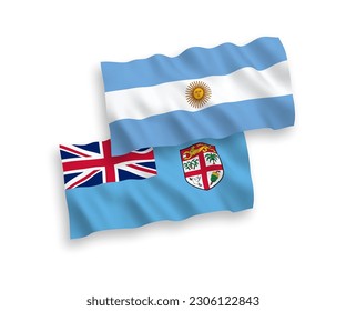 National vector fabric wave flags of Republic of Fiji and Argentina isolated on white background. 1 to 2 proportion.