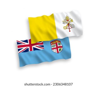 National vector fabric wave flags of Republic of Fiji and Vatican isolated on white background. 1 to 2 proportion.