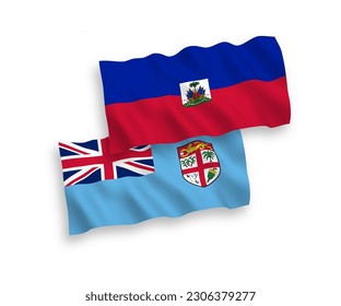 National vector fabric wave flags of Republic of Fiji and Republic of Haiti isolated on white background. 1 to 2 proportion.