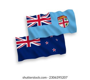 National vector fabric wave flags of Republic of Fiji and New Zealand isolated on white background. 1 to 2 proportion.