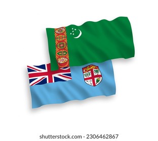 National vector fabric wave flags of Republic of Fiji and Turkmenistan isolated on white background. 1 to 2 proportion.