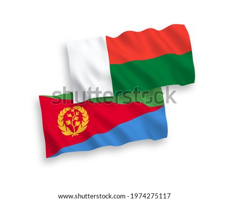National vector fabric wave flags of Eritrea and Madagascar isolated on white background. 1 to 2 proportion.