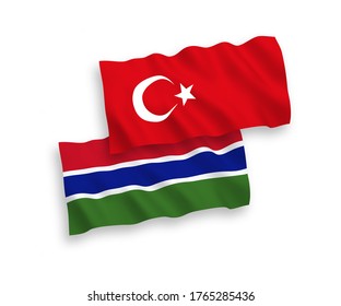 Nationale Vektorgrafik-schwenkende Flaggen der Türkei und der Republik Gambia einzeln auf weißem Hintergrund. 1 bis 2 %.