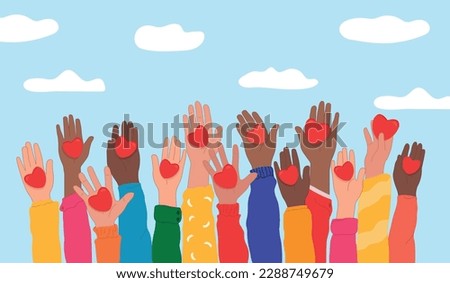 National Volunteering Month is celebrated every year in April. Compassion. Hands raised up hold hearts, share compassion and hope with those in need. The concept of sharing love