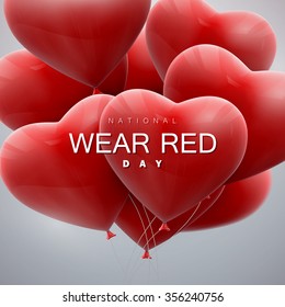 National wear red day. Vector holiday illustration of flying bunch of balloon hearts. 