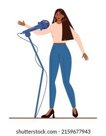 Native American businesswoman standing behind a microphone. Character wearing business casual clothing perform with mictophone, open mic. Flat vector illustration