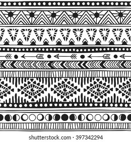 Native American doodle. Textile print with Navajo tribal ornament. Hipster black Ink art work. Aztec vector illustration.  Ethnic Hand Drawn seamless pattern with American Indian motifs. 