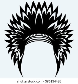 Native american indian headdress. Isolated on blue background. Vector silhouettes