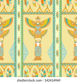 Native american indigenous ornamental seamless pattern background with feathers and totem poles.