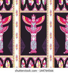 Native american indigenous ornamental seamless pattern background with feathers and totem poles.