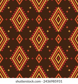 Native pattern in the style of embroidery. Seamless pattern features colorful geometric shapes, including squares, triangles, and diamonds, arranged in rows on a white background.