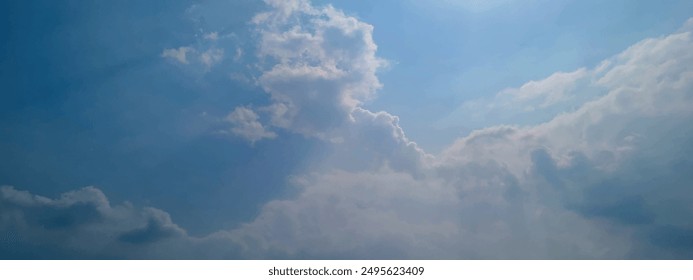 Natural and cloudy fresh blue sky background. Natural sky beautiful blue and white texture background. Blue sky and cloud on summer daytime. Blue sky and white clouds of daytime