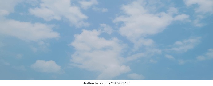 Natural and cloudy fresh blue sky background. Natural sky beautiful blue and white texture background. Blue sky and cloud on summer daytime. Blue sky and white clouds of daytime