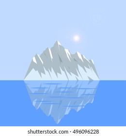 Natural Ice with reflection on a blue background among the water.
