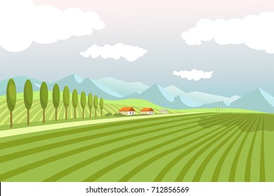 Natural landscape with wide plowed fields and high mountains