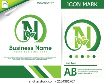 Natural letter n with leaf colorful logo template