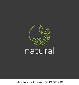 Natural logo with green leaves. Natural, eco. Natural badge for green company. Vector minimalistic line logo in circle form.