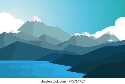 Natural panorama view of the mountain range with some snow on the top of mountain hat, near the ocean sea coast with clear blue sky for wallpaper, background or backdrop