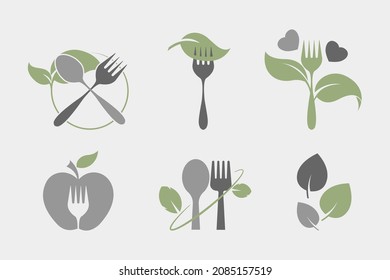 Natural plant based vegetarian food icon set. Spoon, fork and leaves illustration. Flat style. Isolated on white background. 