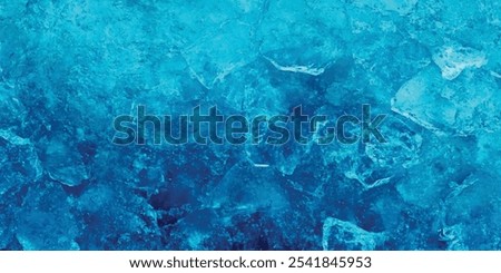 Natural scratched ice at the ice rink as texture. blue background. beautiful winter ice wallpaper. ice texture cracks baikal abstract background