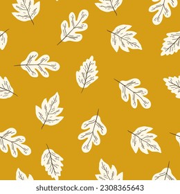 Natural seamless pattern with autumn fallen leaves of forest trees. Bright colored botanical seasonal vector illustration in flat style for wrapping paper, wallpaper, fabric print.