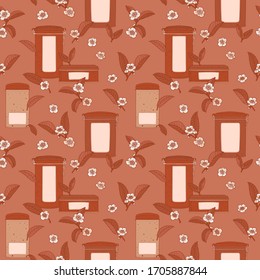 Natural seamless pattern with tea boxes and flowers, brown background