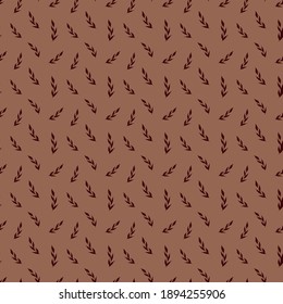 Natural vector seamless pattern leaves on brown background. Template for the design of wallpaper, tiles, fabrics and dishes