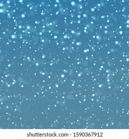 Natural winter background with blue sky, snowfall, snowflakes in various forms
