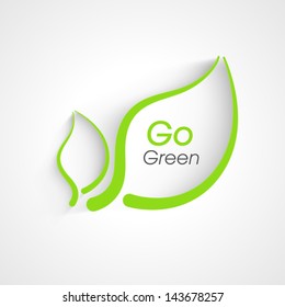 Nature background with green leafs and text go green.