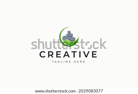 Nature Balancing Rock Logo Design Template. Balanced stacked stone on the leaf design. Creative Vector Icon Design Concept.