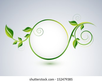 Nature concept with green leafs and space for your text on abstract grey background. 